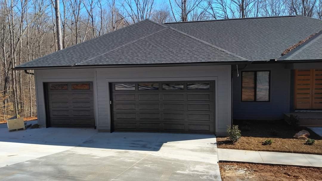 Modern gray garage doors on a contemporary home