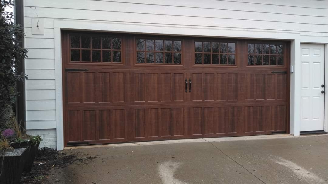 Wood-look walnut carriage-house garage door